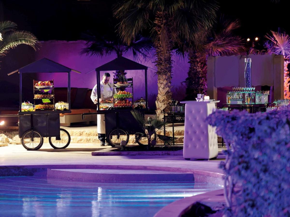 Moevenpick Resort & Spa Dead Sea Sweimeh Esterno foto Poolside at the Ritz-Carlton, Dubai
